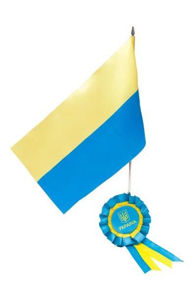 Прапор України та печатку зі стрічкою синього, жовтого. ізольовані на нітрохи — стокове фото