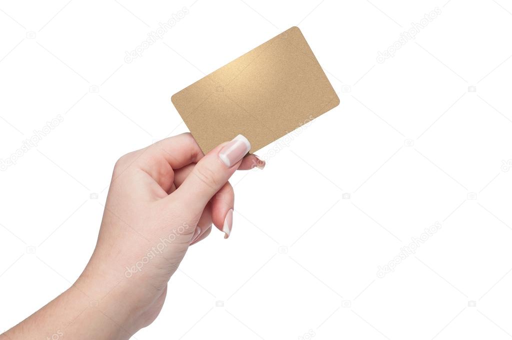 Woman holding gold credit card in hand