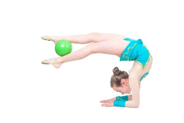 Little girl gymnast with green ball — Stock Photo, Image