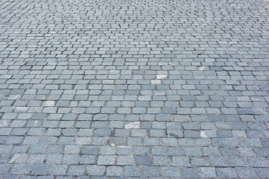 Background of sett. Cobblestone pavement. Texture. clipart