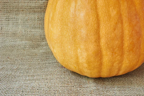 Autumn pumpkin on a burlap in a rustic style — 스톡 사진