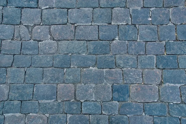 Background of sett. Cobblestone pavement. — Stock Photo, Image