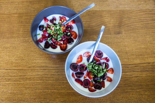 healthy yogurt with cherries and strawberry