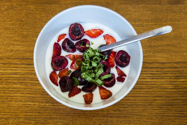 healthy yogurt with cherries and strawberry