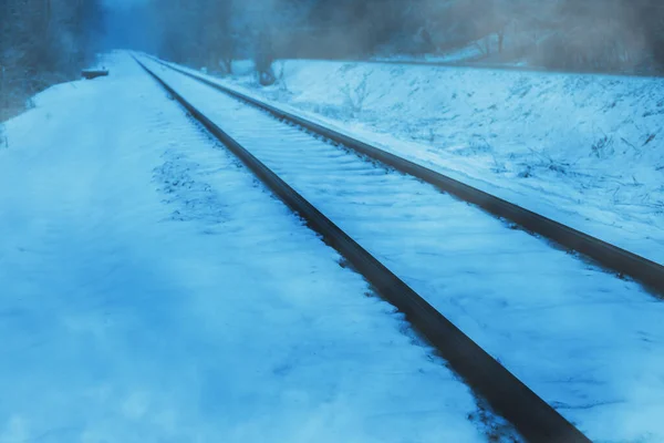 Railway track covered by snow.Winter image.High quality photo.