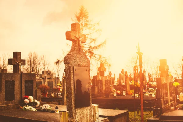Gravestones on the cemetery.Clouds in background.High quality photo. — Stock Photo, Image
