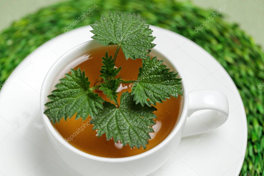 Fresh Nettle. Nettle Tea Popular Herbal drink. Flush Out Toxins With Detox Drink