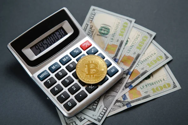 Gold bitcoin coin, dollar bill Black electronic calculator. Crypto Investing cryptocurrency exchange money. Bitcoin to USD — Stock Photo, Image