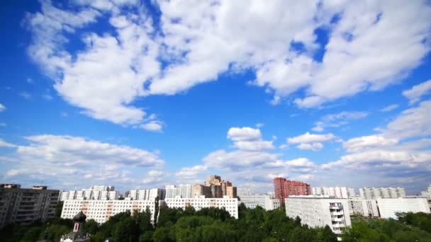 Beautiful clouds over the houses — Stock Video