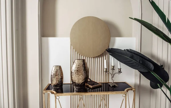 designer apartment interior shelf cabinet with souvenirs bottles figurines bar mirror table chair