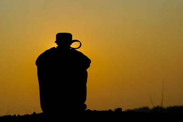 Silhouette shot of Army water — Stock Photo, Image