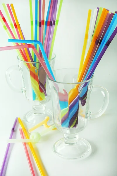 empty Glass and cocktail straws