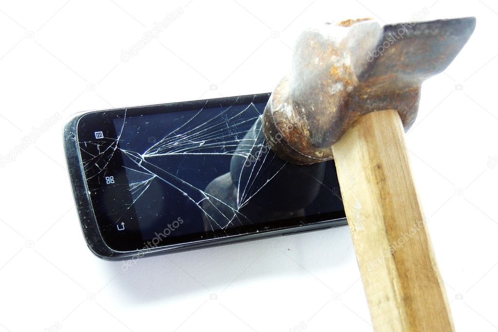 Broken phone screen and hammer 