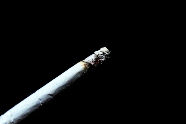 Cigarette on black background — Stock Photo, Image