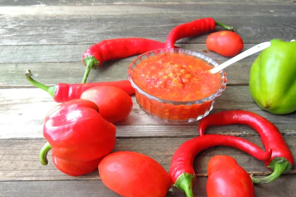Adjika picante com pimentas quentes — Fotografia de Stock