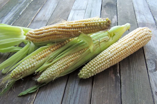 Corn on wooden background — Stock Photo, Image