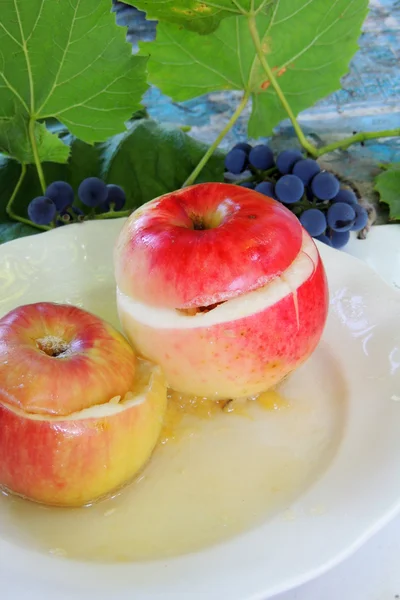 Apple stuffed with banana and baked in the oven — Stock Photo, Image