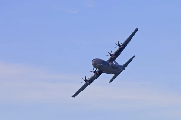 Military airplane in the skyes Stock Photo