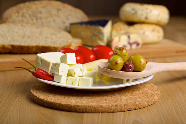 Feta cheese, olives and red chilli pepper — Stock Photo, Image