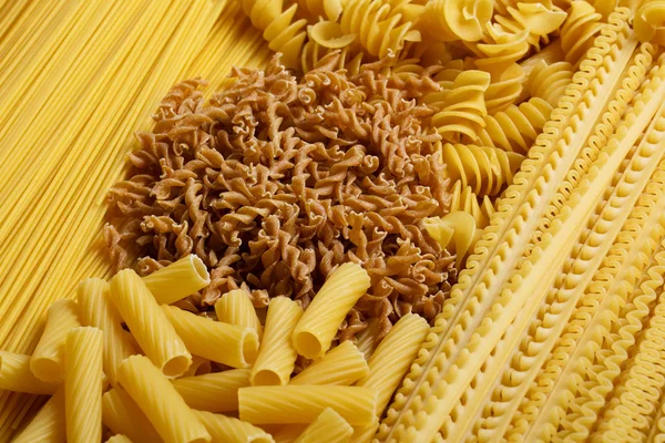 Different types and shapes of Italian pasta — Stock Photo, Image
