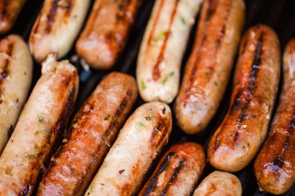 Barbecued beef and pork sausages — Stock Photo, Image