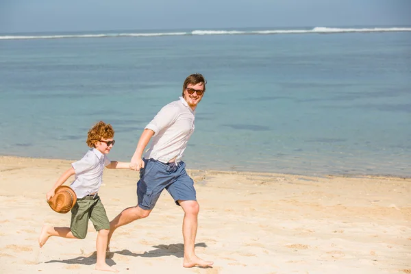 Hipster father with beard and red haired son having happy summer time at a sunny day. — Stock Photo, Image