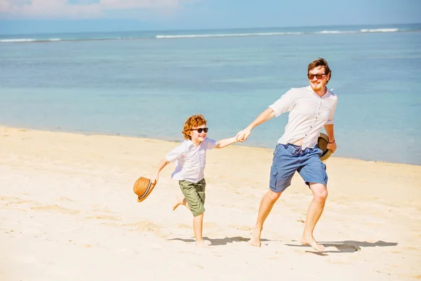 Hipster father with beard and red haired son having happy summer time at a sunny day. — Stock Photo, Image