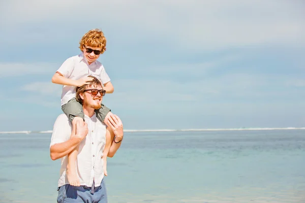 Hipster father with beard and red haired son having happy summer time at a sunny day. — Stock Photo, Image