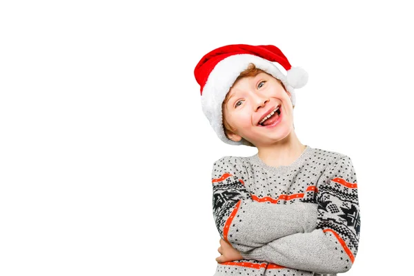Portrait of a boy in christmas hat with happy and joyful facial expression — Stock Photo, Image