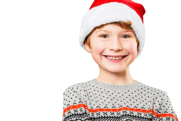 Portrait of a boy in christmas hat with happy and joyful facial expression — Stock Photo, Image