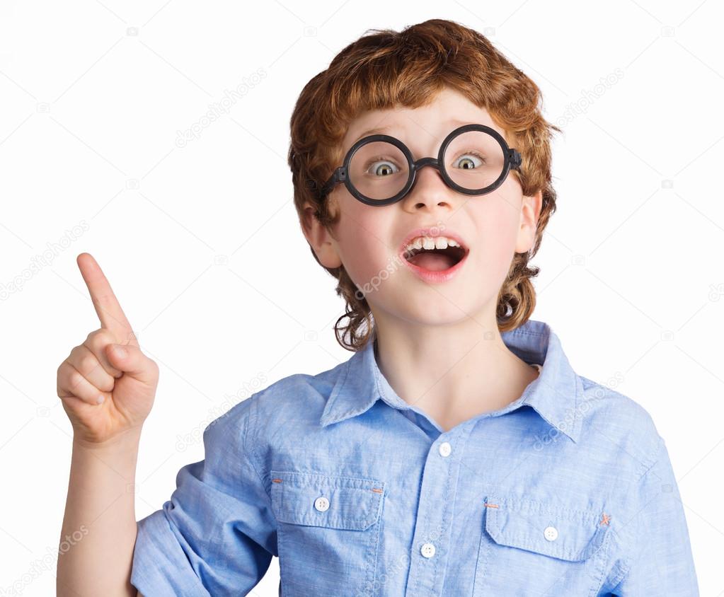 Portrait of handsome boy in round glasses who just has got an idea. Isolated on white background