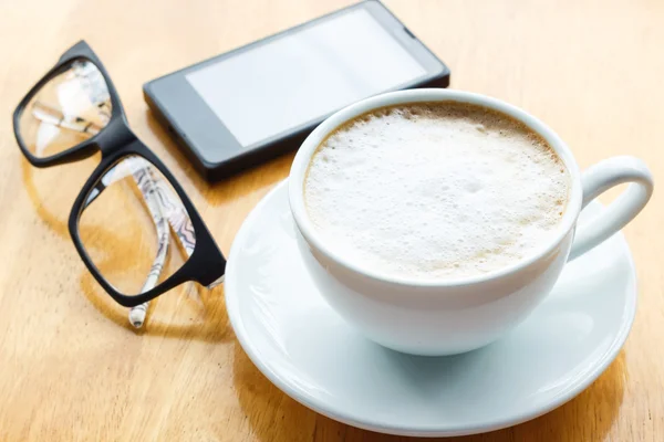 Close up coffee cup on wood table — Stock Photo, Image