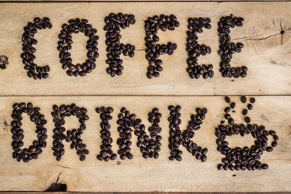 Zrnková káva pití pozadí textu — Stock fotografie