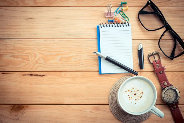 Coffee cup on workspace wood table — Stock Photo, Image