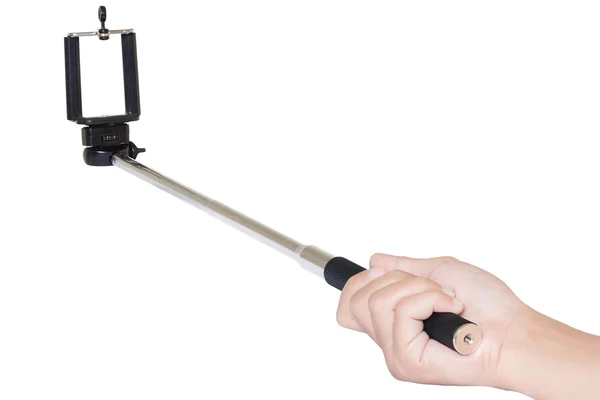 Mão segurando vara selfie isolado com recorte caminho no branco b — Fotografia de Stock