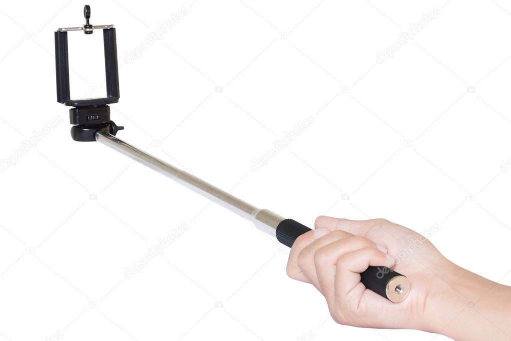 hand holding selfie stick isolated with clipping path on white b