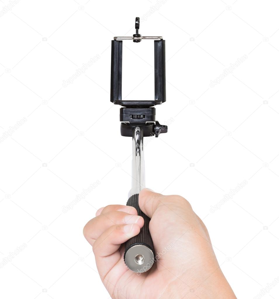 hand holding selfie stick isolated white clipping path inside