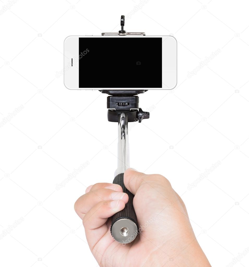hand holding selfie stick isolated white clipping path inside