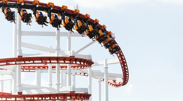 Funny people playing roller coaster — Stock Photo, Image