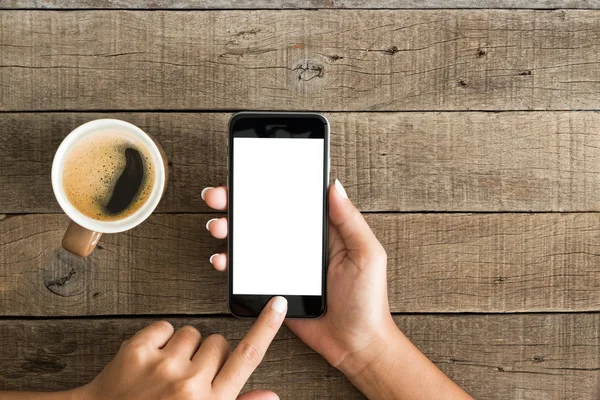 Hand met behulp van telefoon wit scherm op bovenaanzicht — Stockfoto