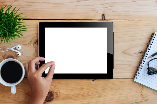 Hand using mockup tablet on wood desk white display — Stock Photo, Image