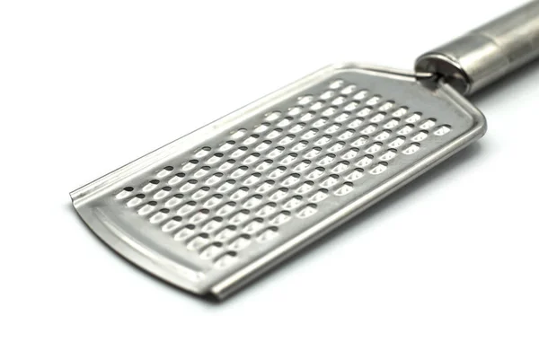 Closeup ของ Grater โลหะบนพ นหล ขาว — ภาพถ่ายสต็อก