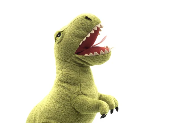 白い背景に立つ緑の恐竜のぬいぐるみの閉鎖 — ストック写真