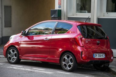 Mulhouse - France - 24 May 2021 - Rear view of red KIA Picanto sport parked in the street  