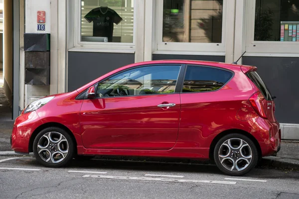 Mulhouse - France - 24 May 2021 - Profile view of red KIA Picanto sport parked in the street  