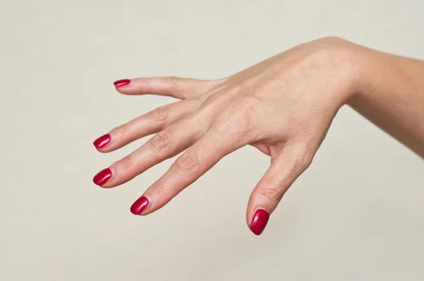 Mujer (d Mano con esmalte de uñas —  Fotos de Stock