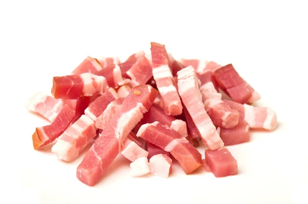 Cubos de tocino sobre fondo blanco — Foto de Stock