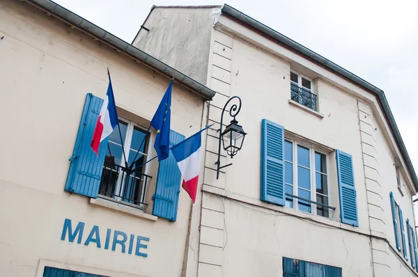 Traditional french city hall with french flags and european flag — Stock Photo, Image