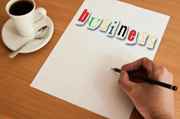 Konzept Büro Tasse Kaffee und Wort Geschäft auf weißer Seite — Stockfoto