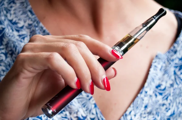 stock image closeup hand of woman with e-cigarette